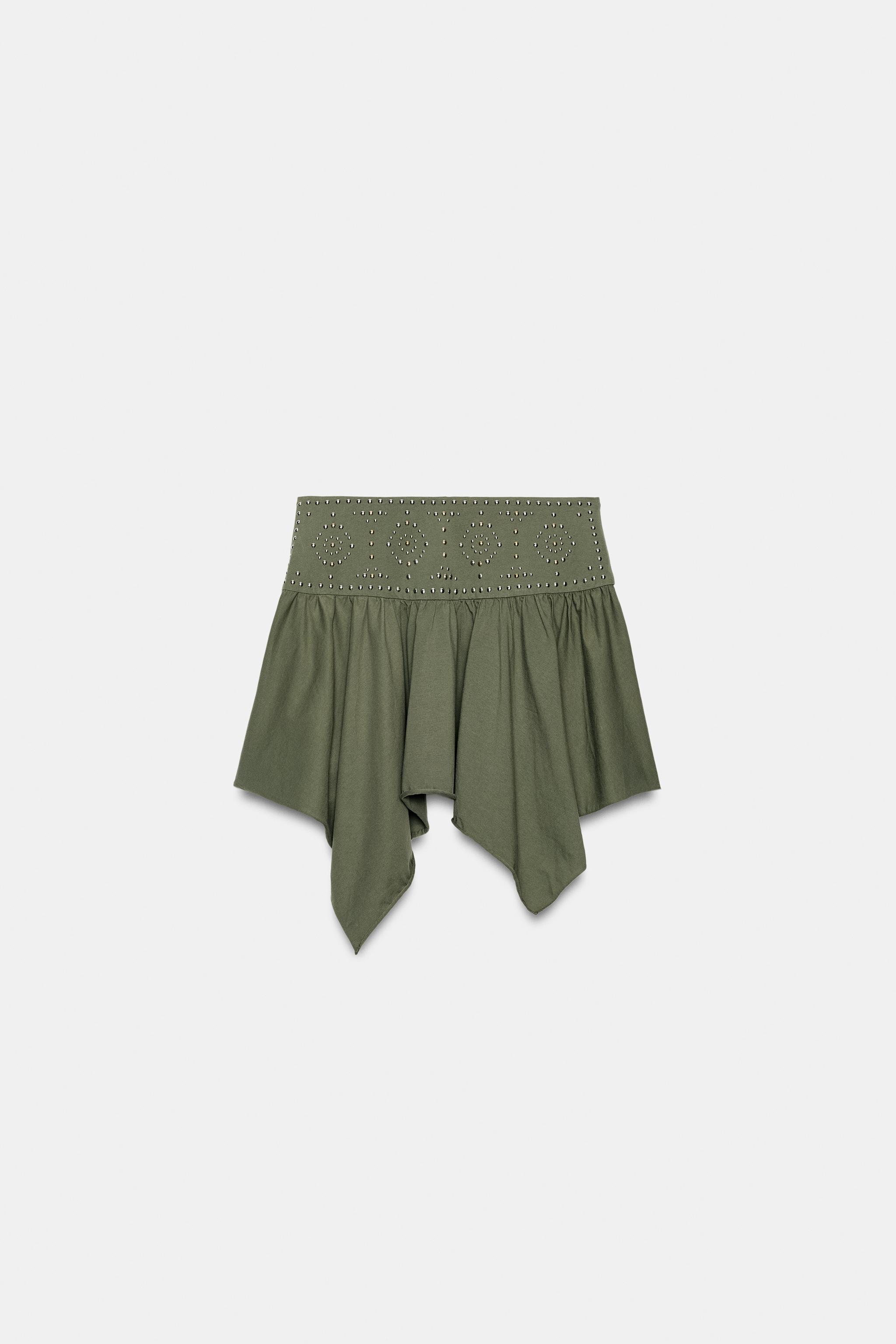 JUPE ASYMÉTRIQUE À CLOUS